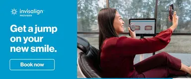 Invisalign digital smile preview shown during a clear aligner consultation